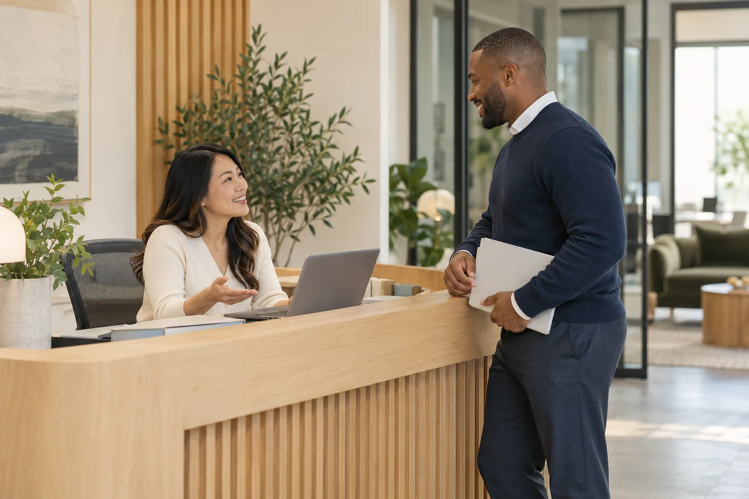 Illustrative office professionals at a reception desk